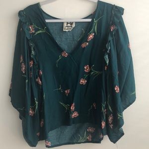 Floral green blouse with ruffles